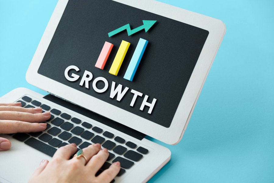 Graph showing improvement of profit on laptop screen